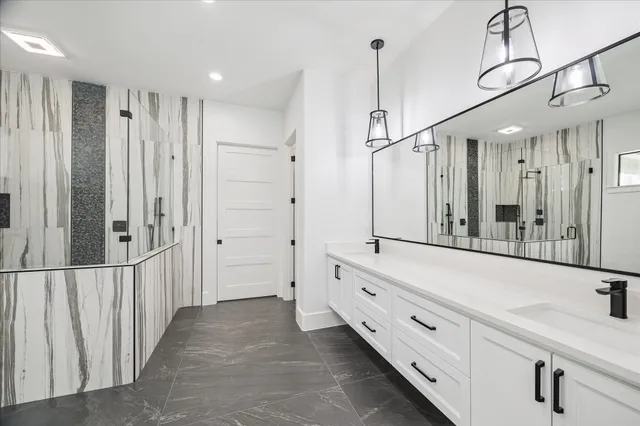 a white bath tub sitting in a bathroom