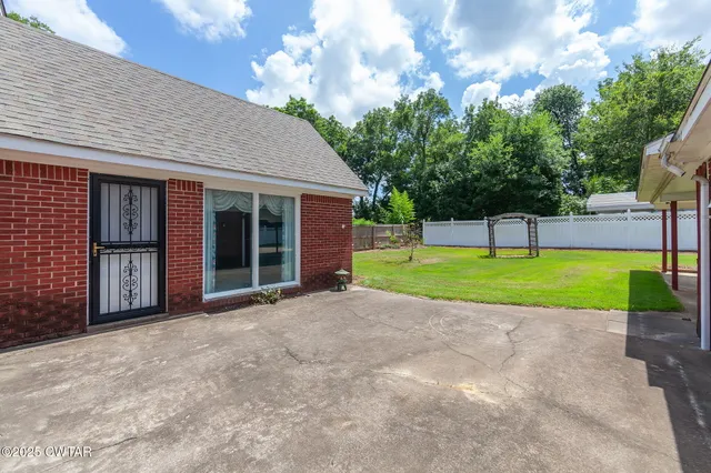 a view of a house with a swimming pool