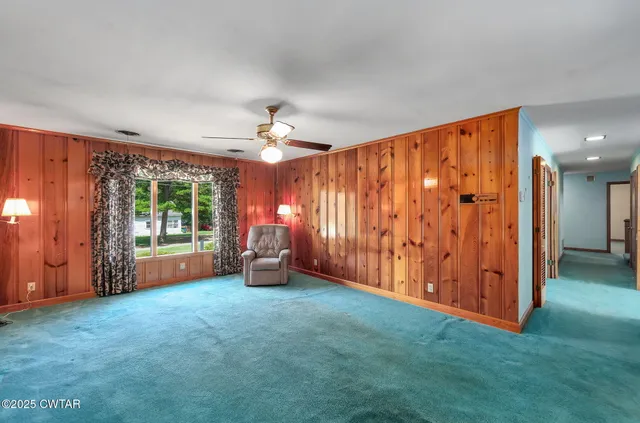 a kitchen with stainless steel appliances refrigerator and cabinets