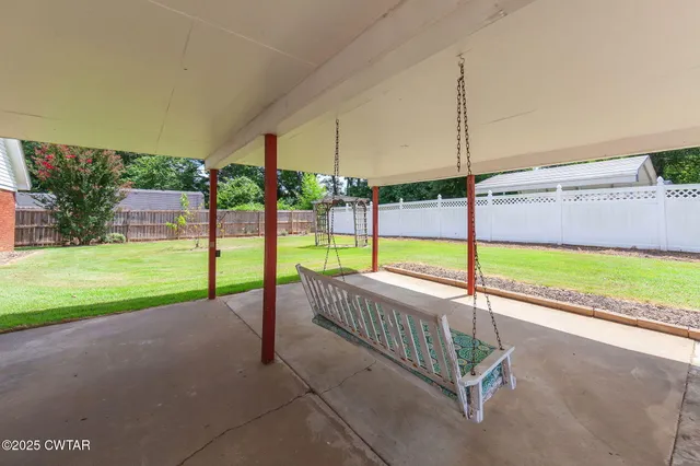 a view of a garden with an outdoor space