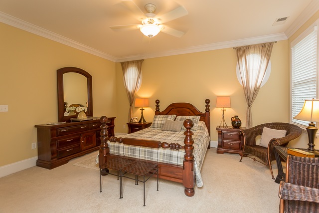 3590 Traveler Road Harrisonburg, VA 22801 - Photo 34 of 50 a bedroom with a bed and wooden floor