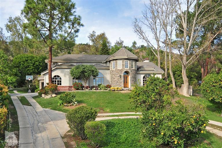 11675 Barranca Road Camarillo, CA 93012 - Photo 1 of 19 a front view of a house with a yard