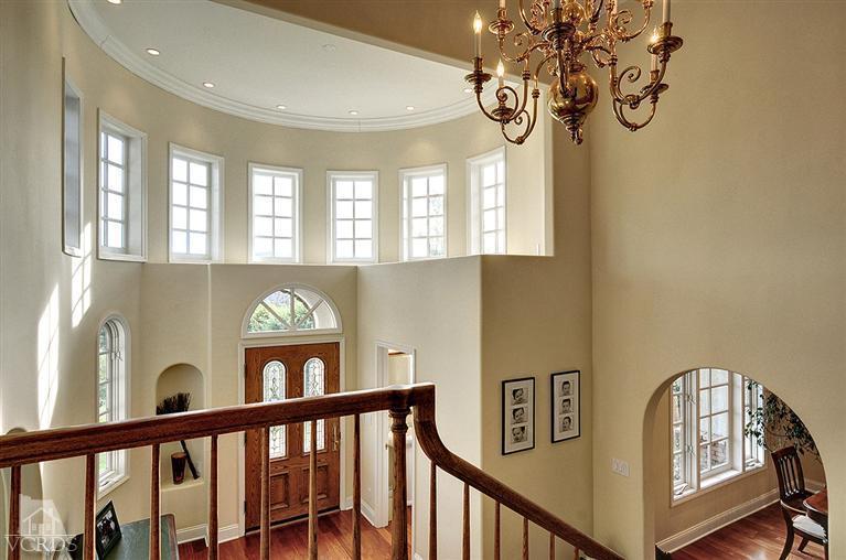 11675 Barranca Road Camarillo, CA 93012 - Photo 11 of 19 a view of entryway with a window and a chandelier