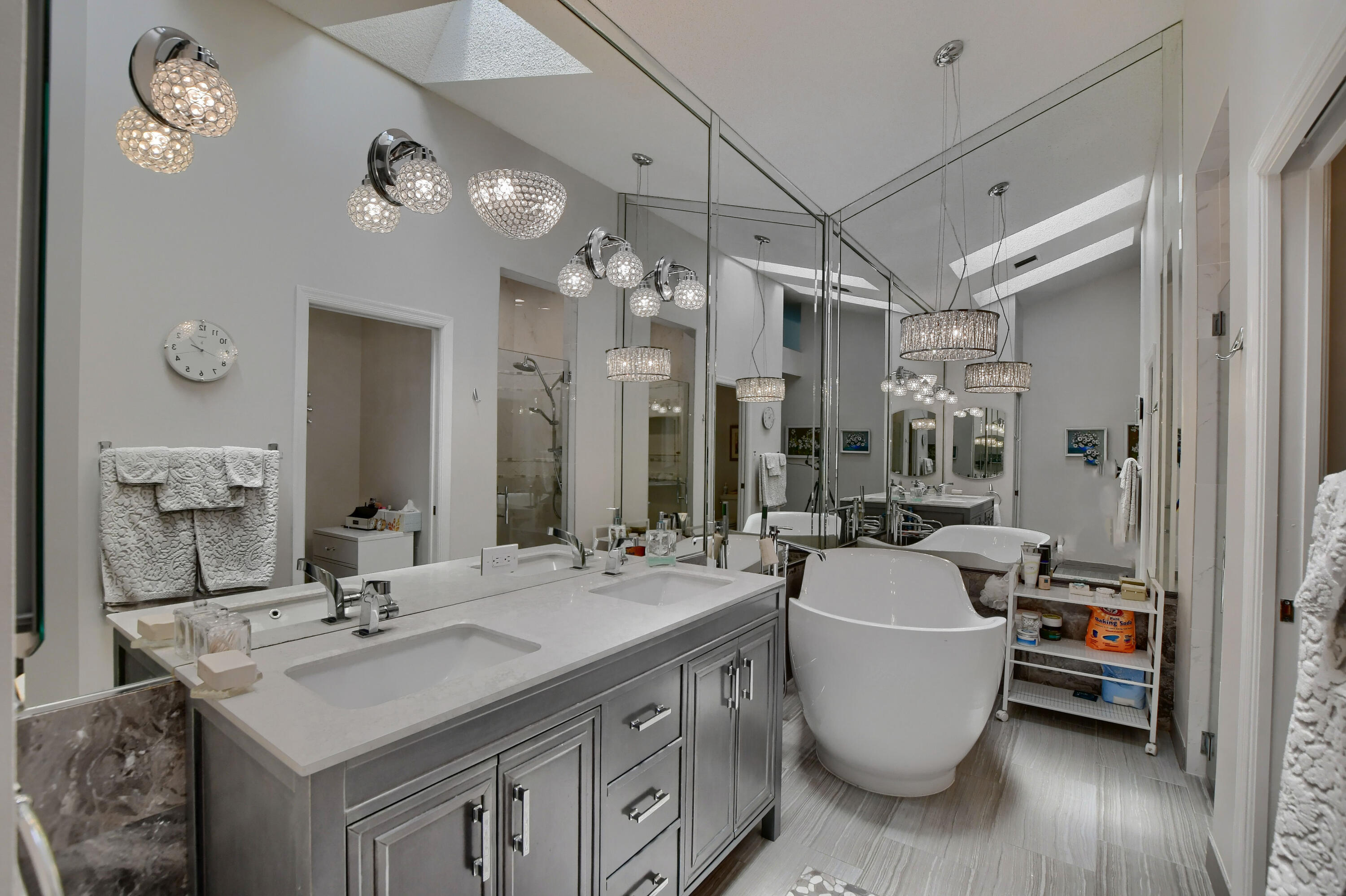 5360 Northwest 20th Avenue Boca Raton, FL 33496 - Photo 15 of 28 a large bathroom with a large tub sink and mirror