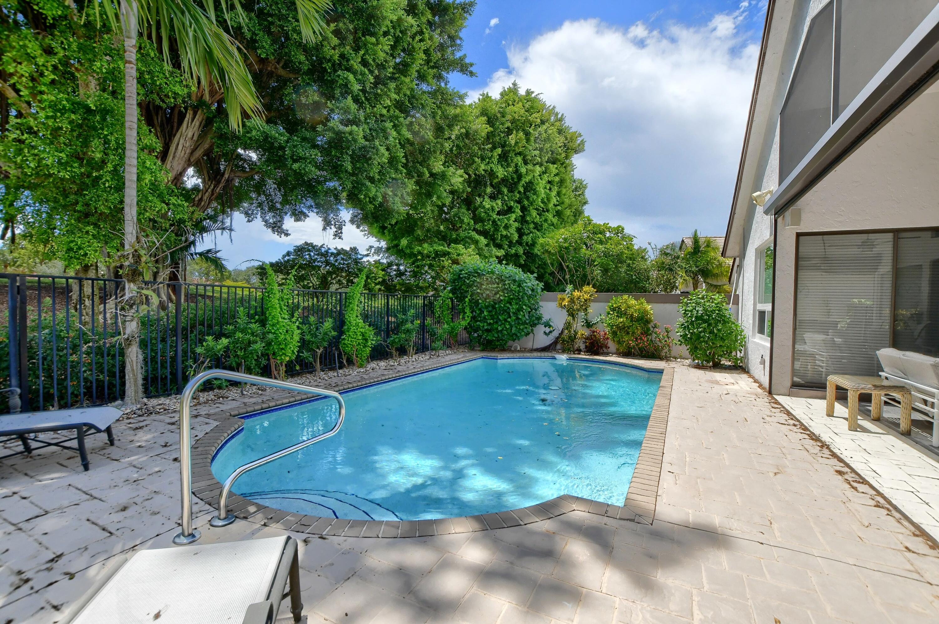 5360 Northwest 20th Avenue Boca Raton, FL 33496 - Photo 25 of 28 a view of a backyard with sitting area