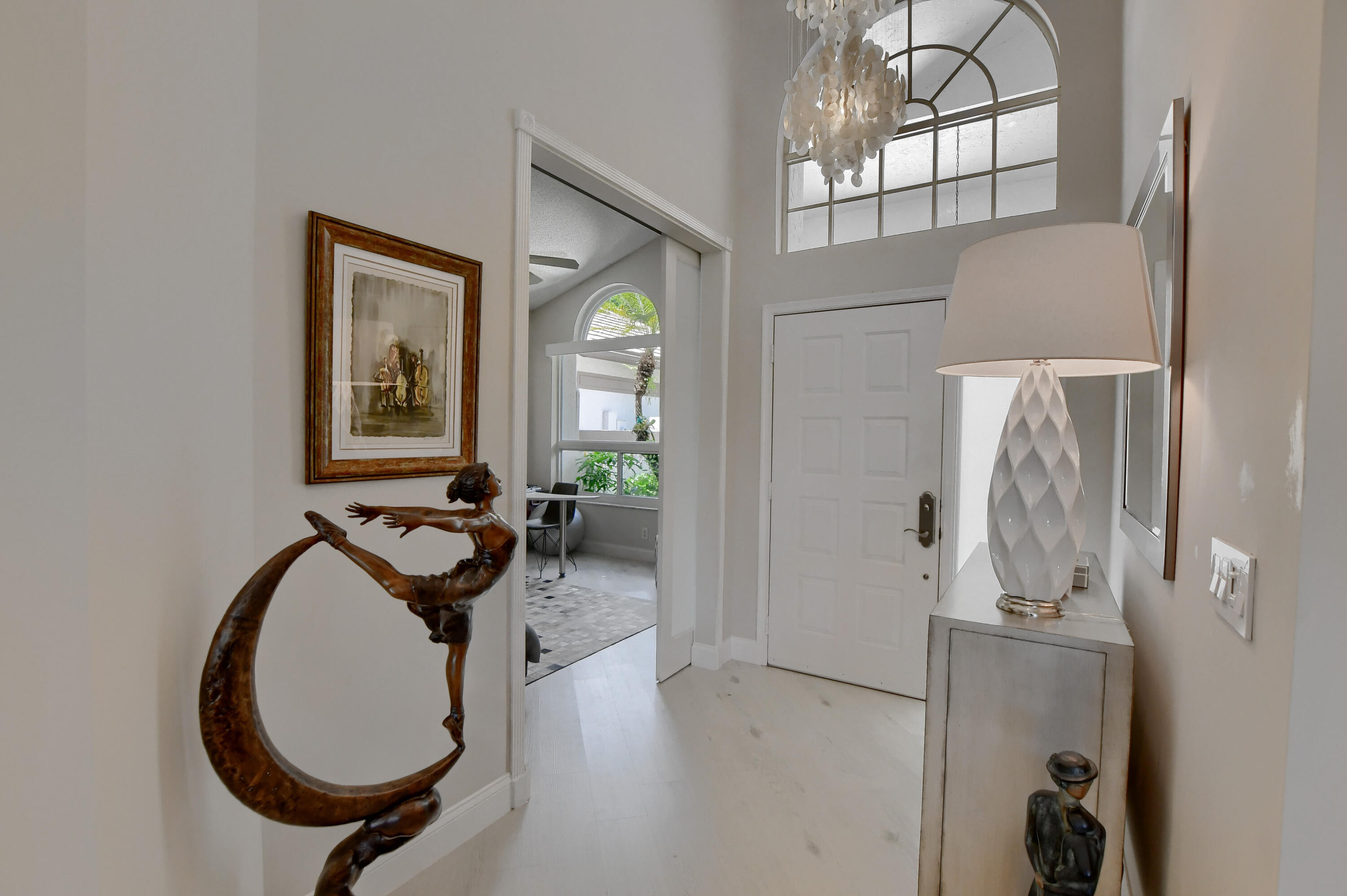 5360 Northwest 20th Avenue Boca Raton, FL 33496 - Photo 3 of 28 a bathroom with a sink and a mirror