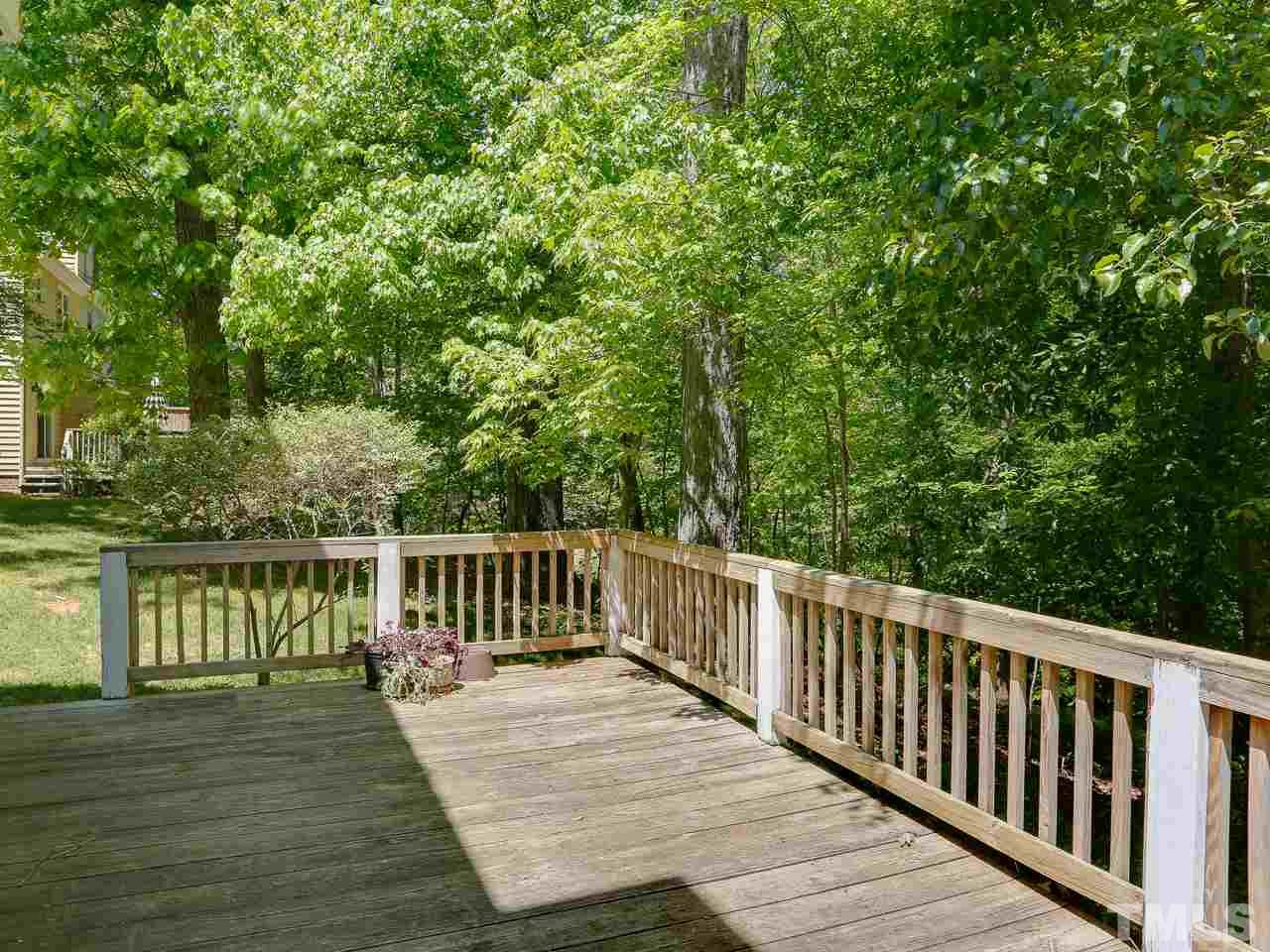 5206 Mountain Ridge Road Raleigh, NC 27612 - Photo 20 of 23 a view of balcony with wooden floor and lake view