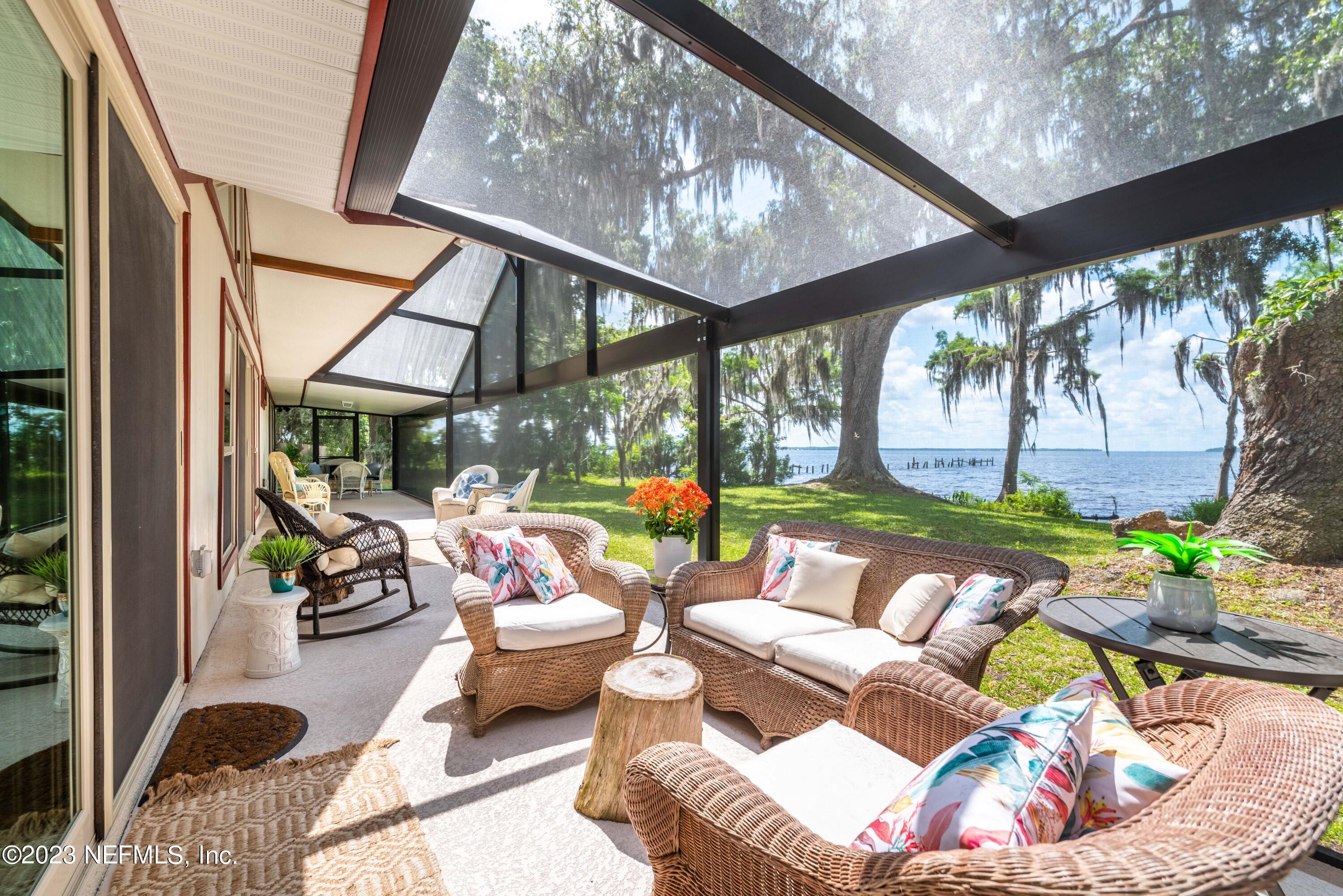 5579 Steamboat Road St. Augustine, FL 32092 - Photo 28 of 52 a outdoor living space with furniture and garden view