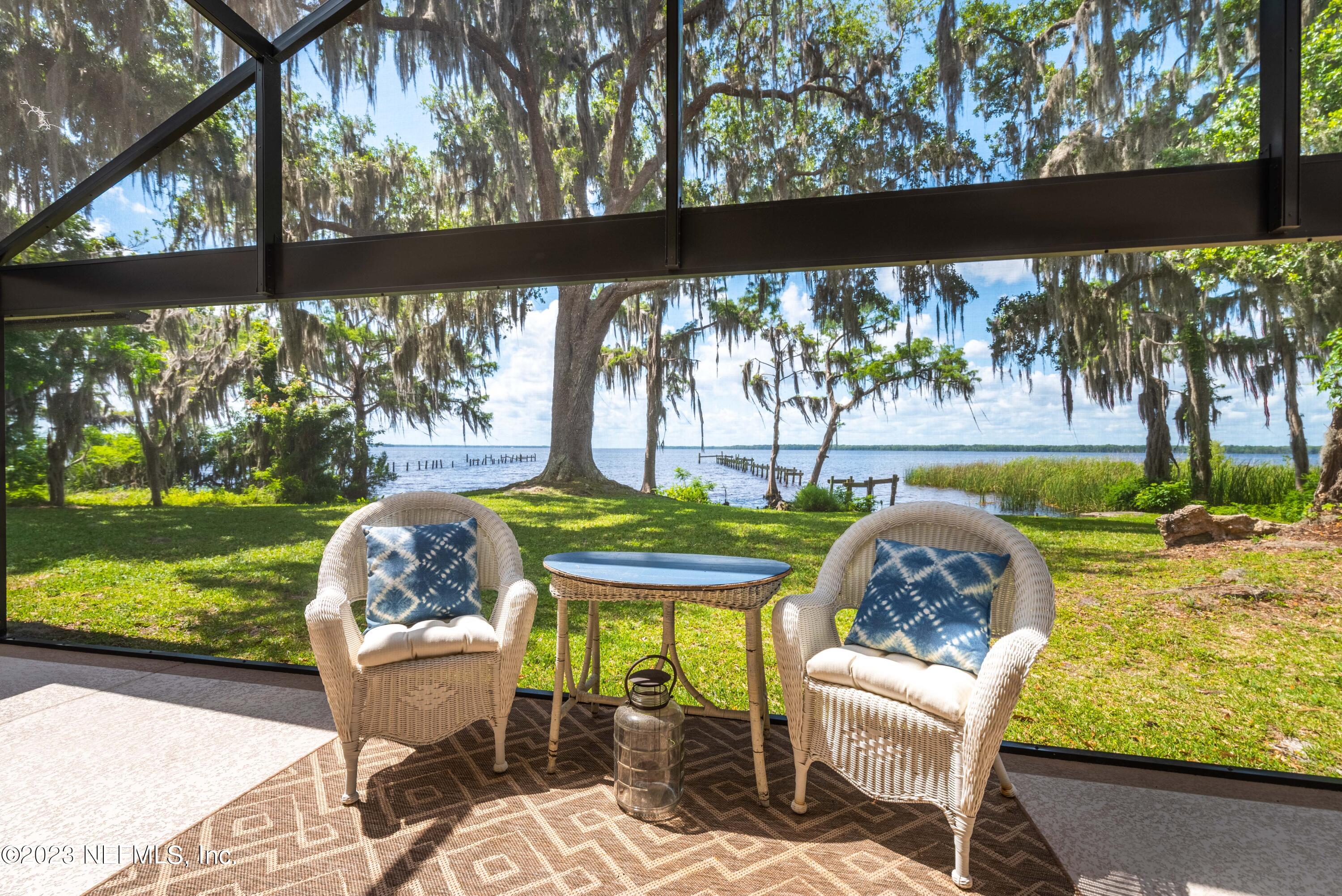 5579 Steamboat Road St. Augustine, FL 32092 - Photo 29 of 52 a view of a two chairs in the deck