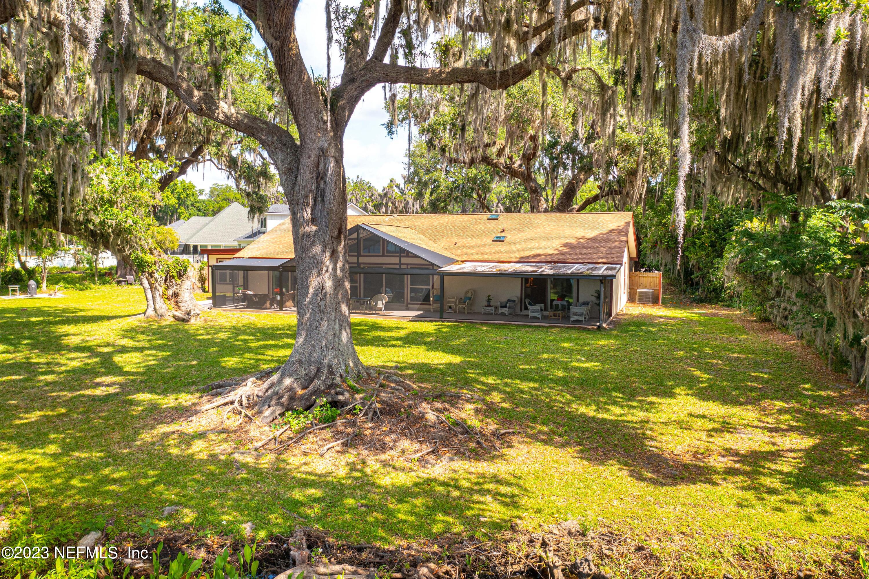 5579 Steamboat Road St. Augustine, FL 32092 - Photo 33 of 52 a front view of a house with a yard
