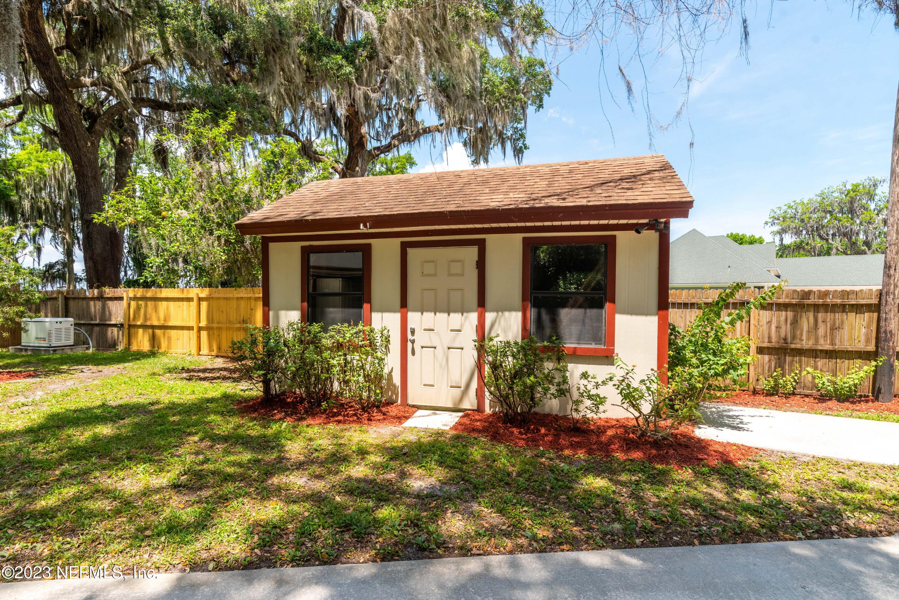 5579 Steamboat Road St. Augustine, FL 32092 - Photo 35 of 52 front view of house with a yard