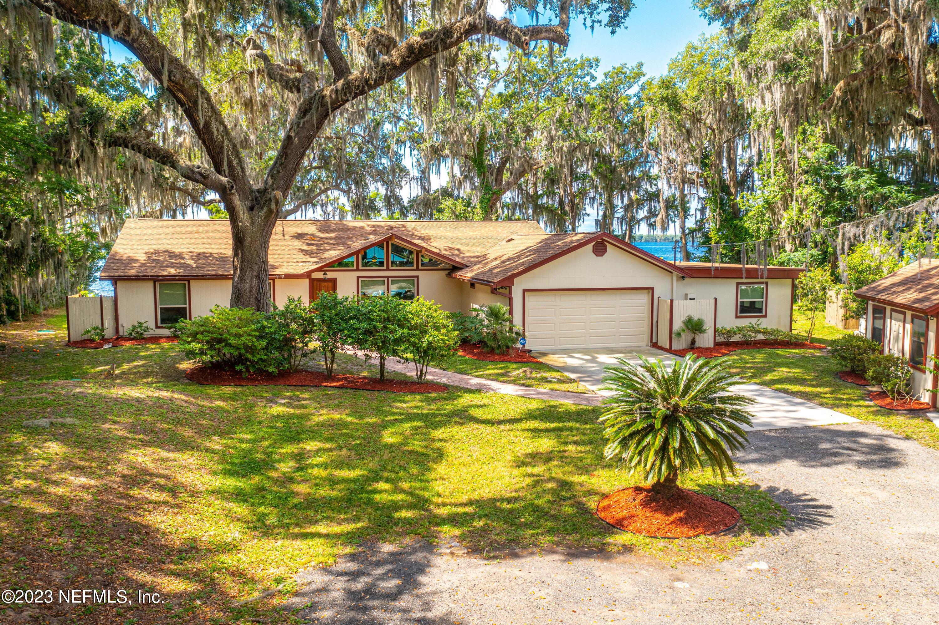 5579 Steamboat Road St. Augustine, FL 32092 - Photo 38 of 52 a house view with a outdoor space