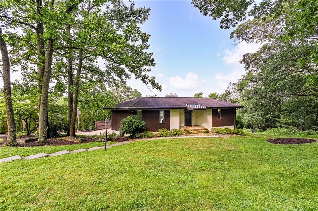 3150 Princeton Road Greensburg, PA 15601 - Photo 2 of 45 a front view of a house with garden