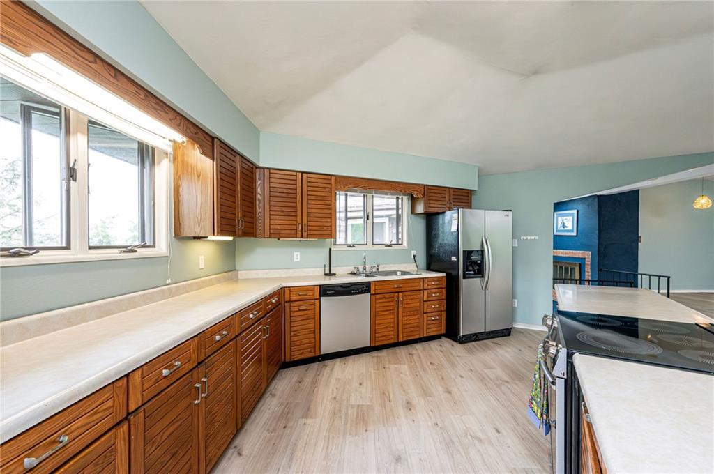 3150 Princeton Road Greensburg, PA 15601 - Photo 22 of 45 a large kitchen with a large window and stainless steel appliances