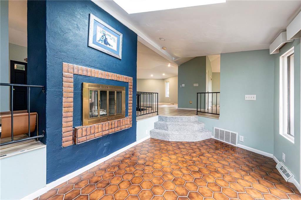 3150 Princeton Road Greensburg, PA 15601 - Photo 24 of 45 a view of livingroom with fireplace and window