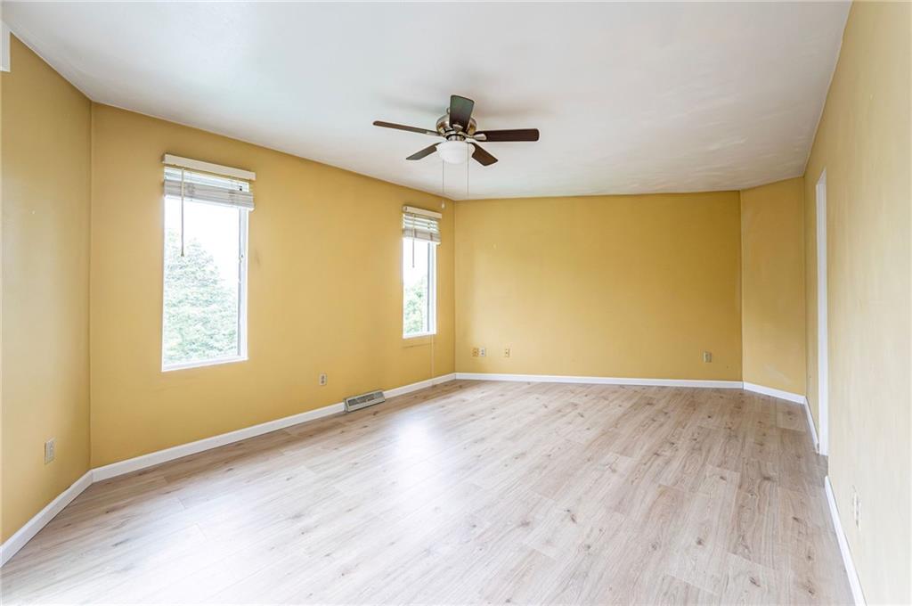 3150 Princeton Road Greensburg, PA 15601 - Photo 26 of 45 wooden floor in an empty room with a window