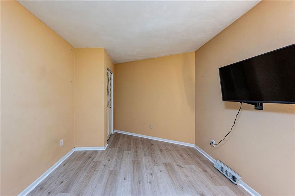 3150 Princeton Road Greensburg, PA 15601 - Photo 30 of 45 a view of room with wooden floor and fan