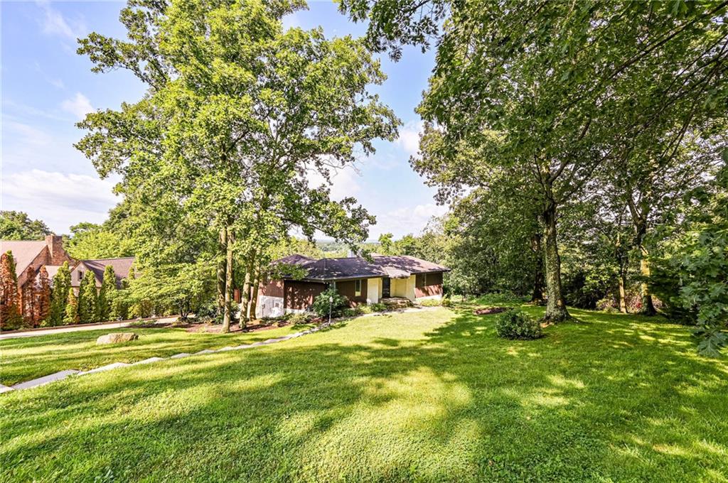 3150 Princeton Road Greensburg, PA 15601 - Photo 3 of 45 a view of swimming pool with outdoor seating and trees