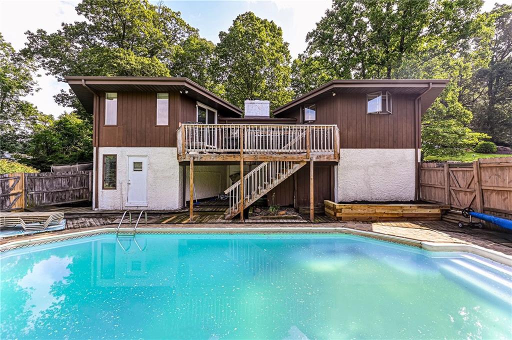 3150 Princeton Road Greensburg, PA 15601 - Photo 43 of 45 a backyard of a house with sofas table and chairs