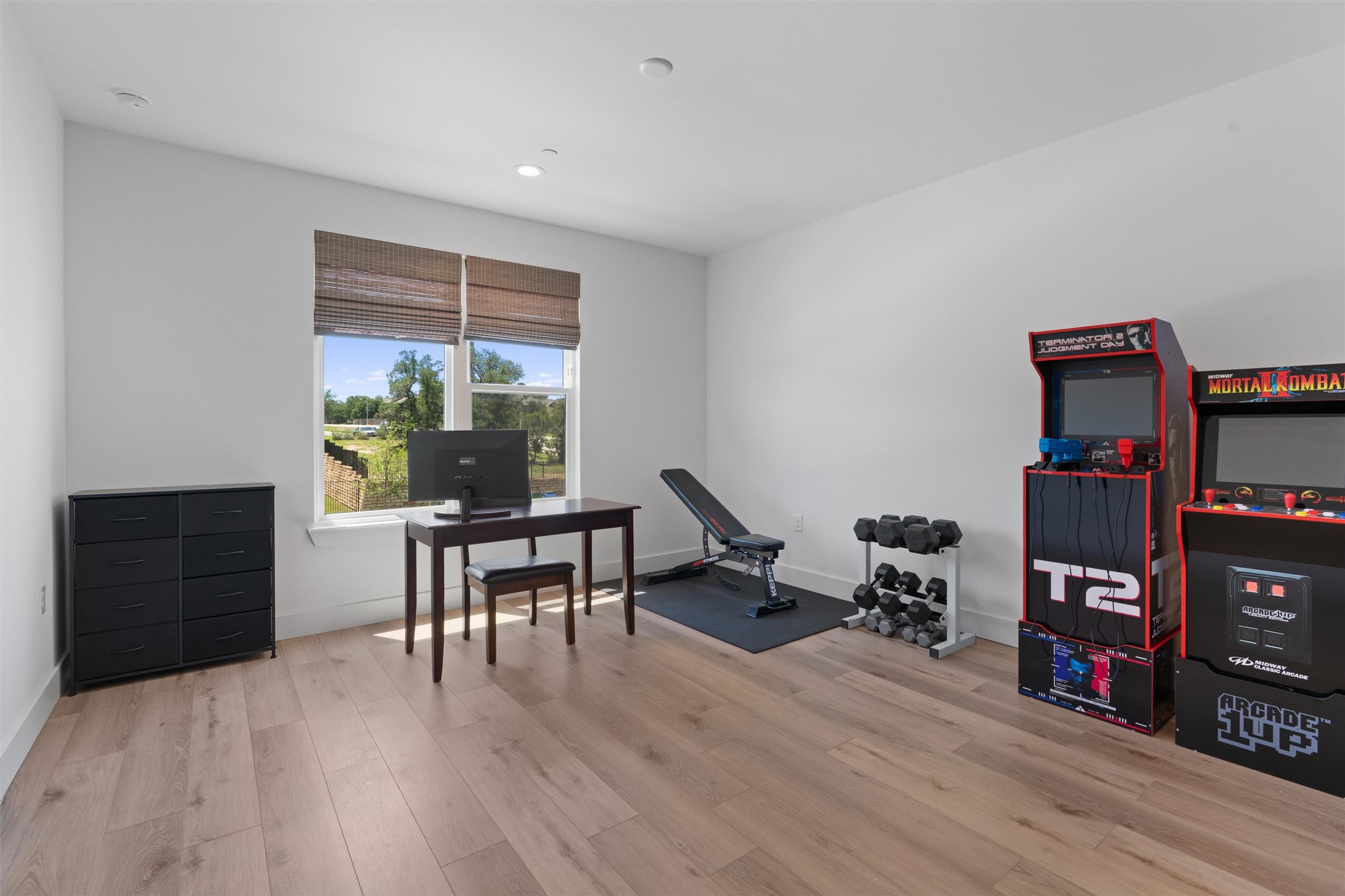 590 Old Mill Road, Unit 153 Cedar Park, TX 78613 - Photo 17 of 40 a dining room with furniture and wooden floor