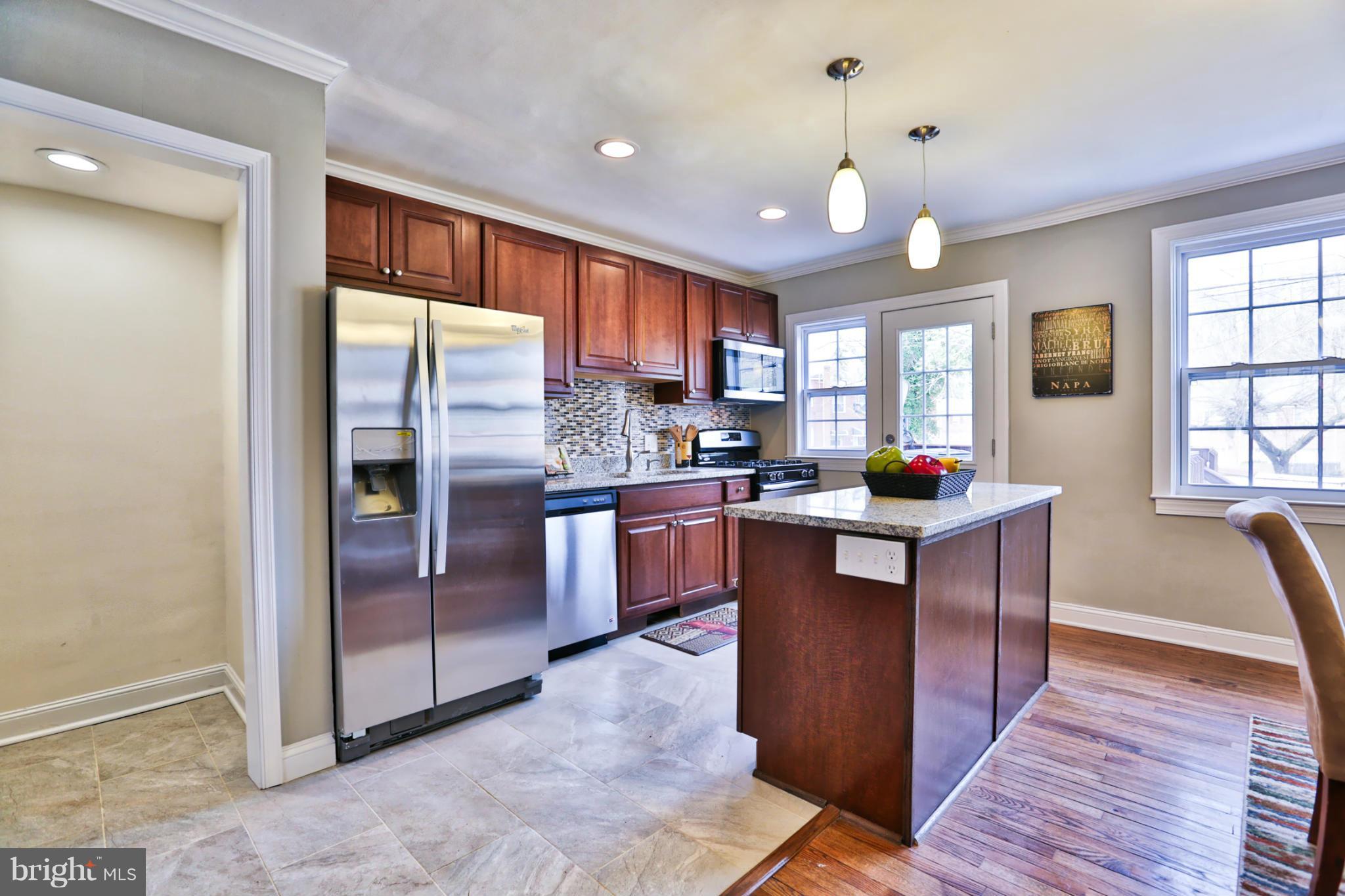 412 Random Road Baltimore, MD 21229 - Photo 5 of 27 Stainless Steel Appliances and Custom Backsplash