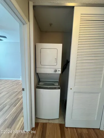 a close view of a utility room with washer and dryer
