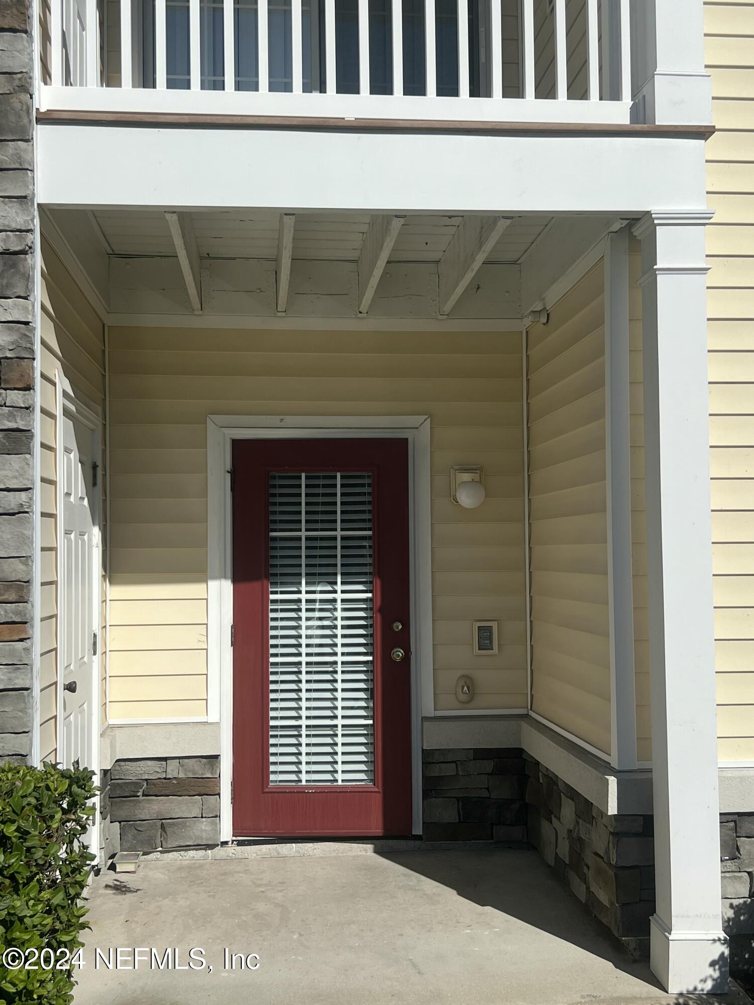 2200 Marsh Hawk Lane, Unit 604 Fleming Island, FL 32003 - Photo 18 of 19 a front view of a house