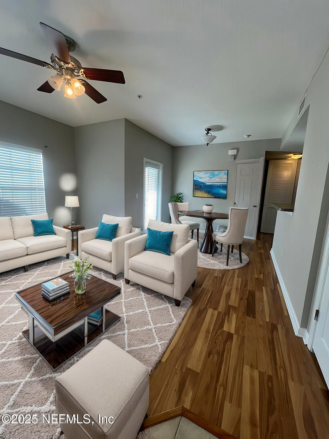2200 Marsh Hawk Lane, Unit 604 Fleming Island, FL 32003 - Photo 19 of 19 a living room with furniture and a wooden floor