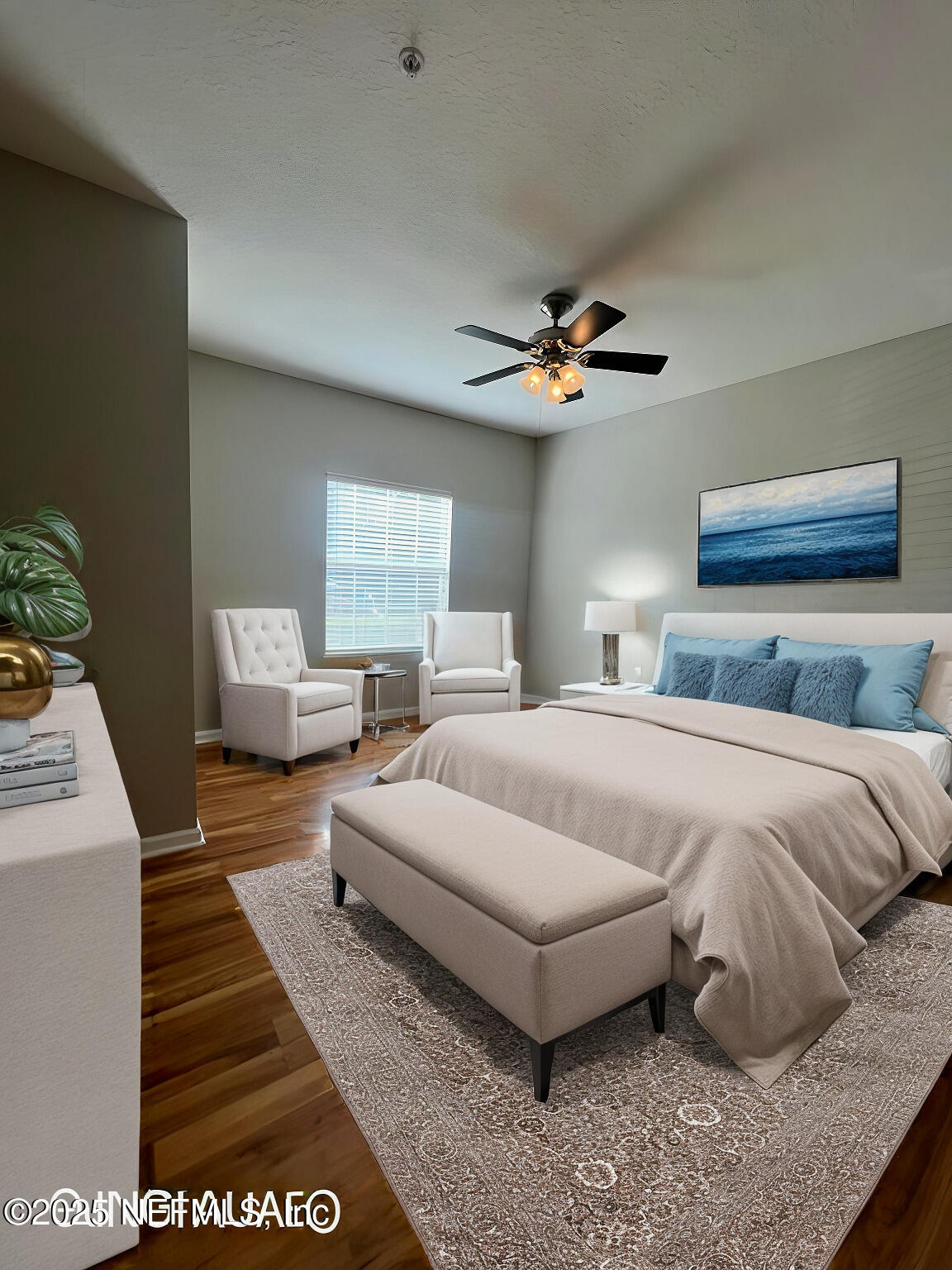 2200 Marsh Hawk Lane, Unit 604 Fleming Island, FL 32003 - Photo 3 of 19 a spacious bedroom with a bed and a chandelier