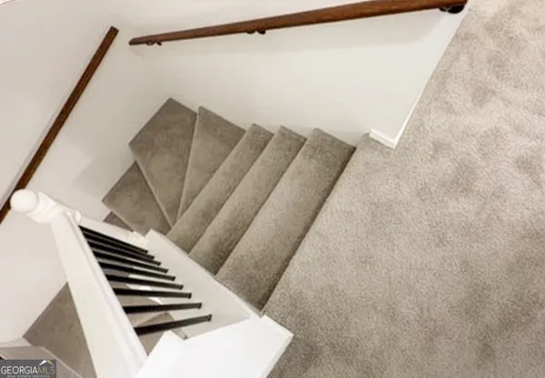 a view of balcony with wooden floor