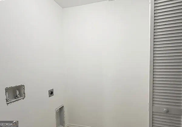 a view of storage and utility room