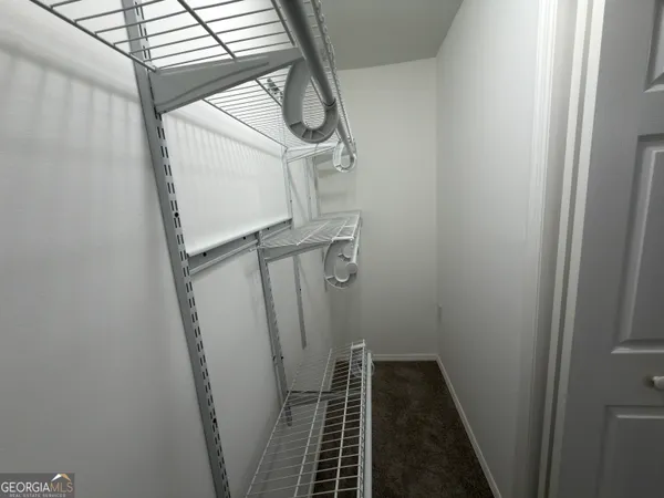 a front view of a house with yard and garage