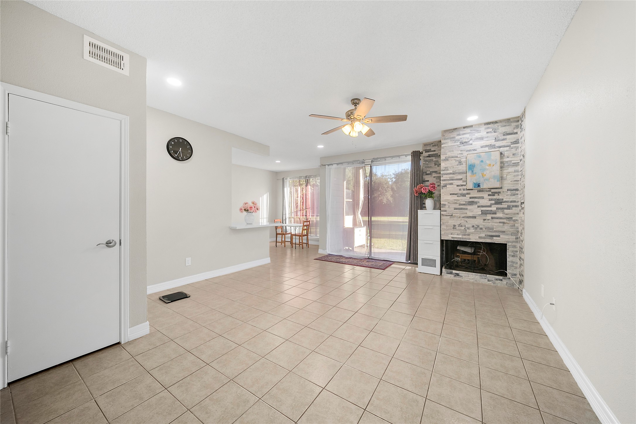 8257 Sands Point Drive, Unit 167 Houston, TX 77036 - Photo 5 of 16 a view of a livingroom with a fireplace