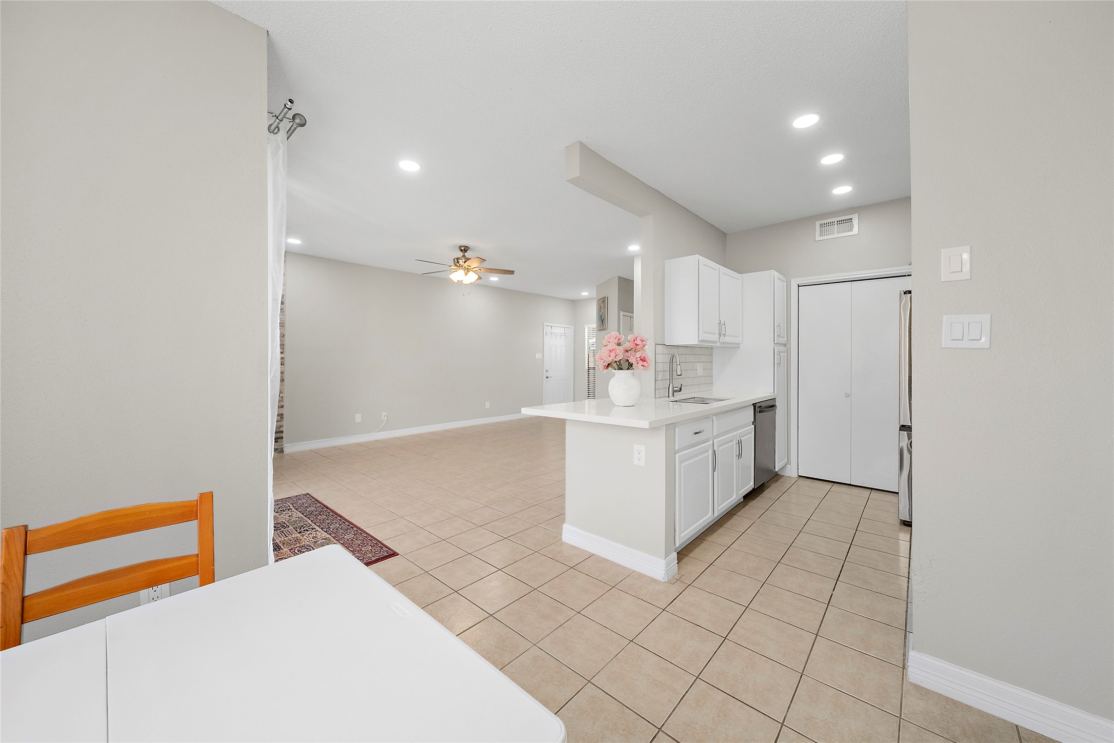 8257 Sands Point Drive, Unit 167 Houston, TX 77036 - Photo 7 of 16 a bathroom with a sink a mirror and a shower