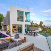 a outdoor space with patio the couches and a potted plant on the table