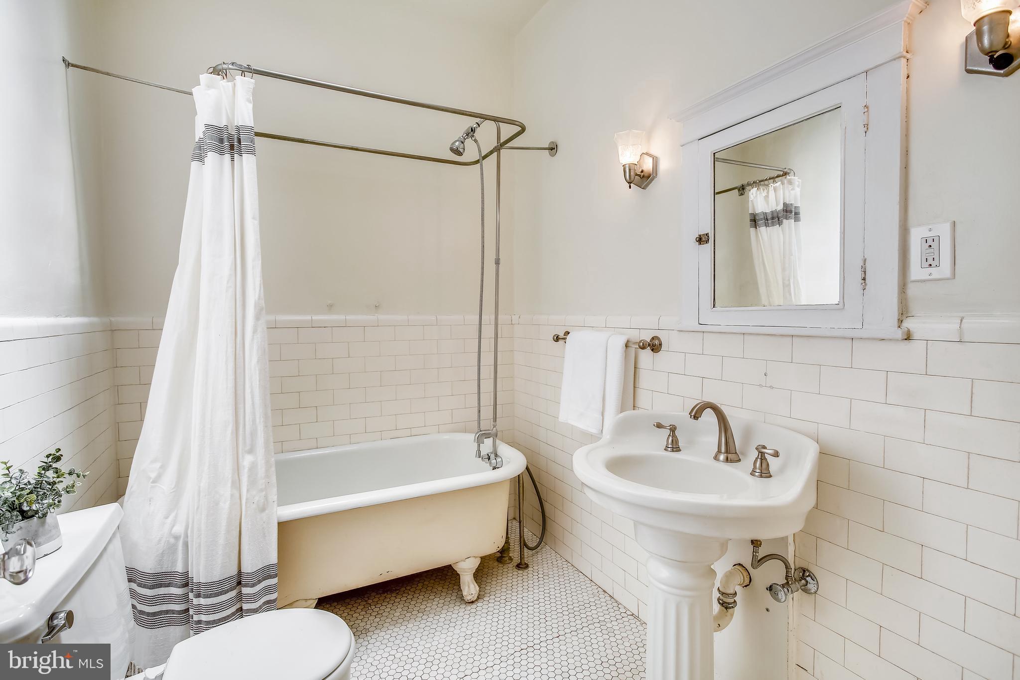 2724 Ontario Road Northwest Washington, DC 20009 - Photo 39 of 93 @nd Hall Bath with original fixtures