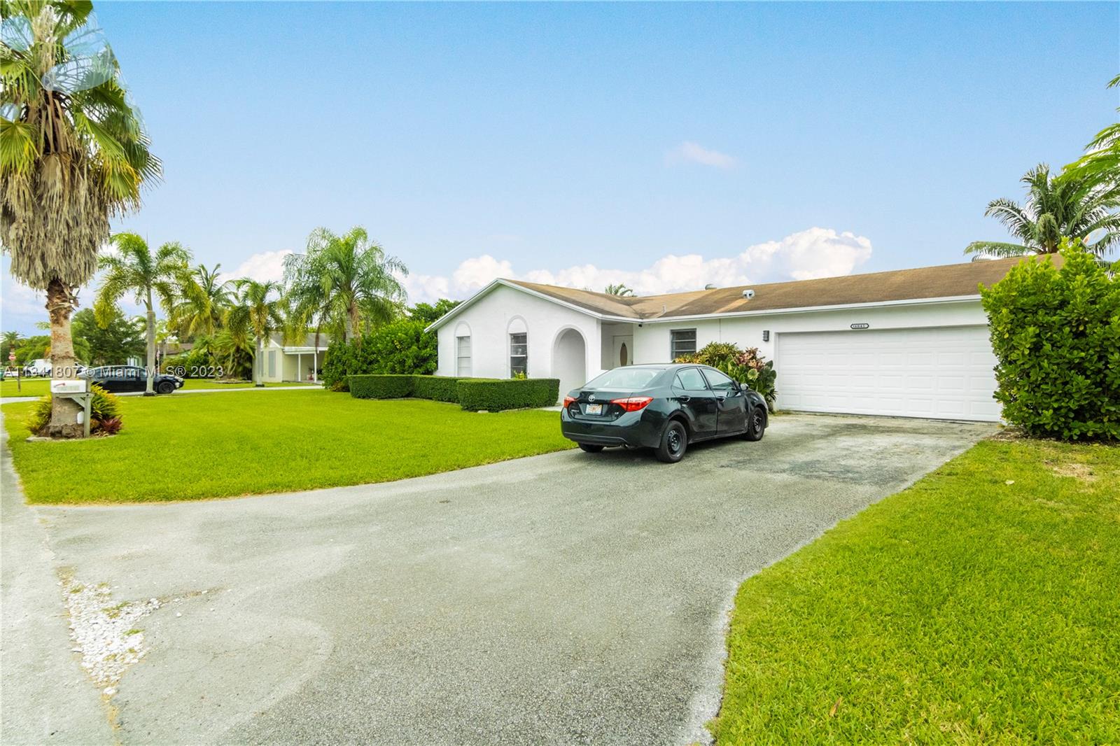 16041 Southwest 284th Street Homestead, FL 33033 - Photo 2 of 20 a view of house with outdoor space and parking