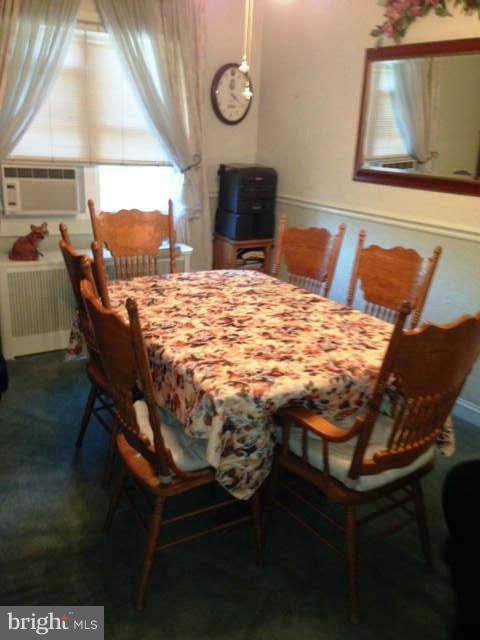 8286 Mission Road Jessup, MD 20794 - Photo 4 of 8 a room with furniture and wooden floor