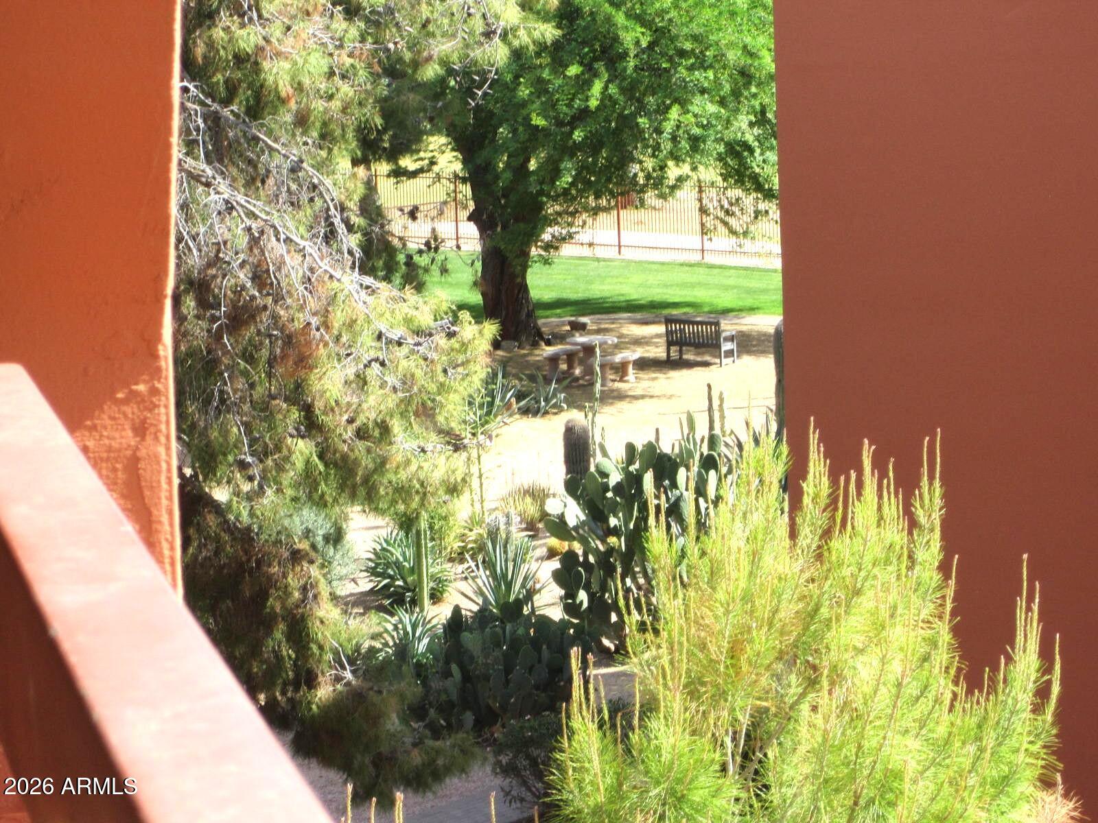 4303 East Cactus Road, Unit 419 Phoenix, AZ 85032 - Photo 1 of 34 a view of swimming pool from a balcony