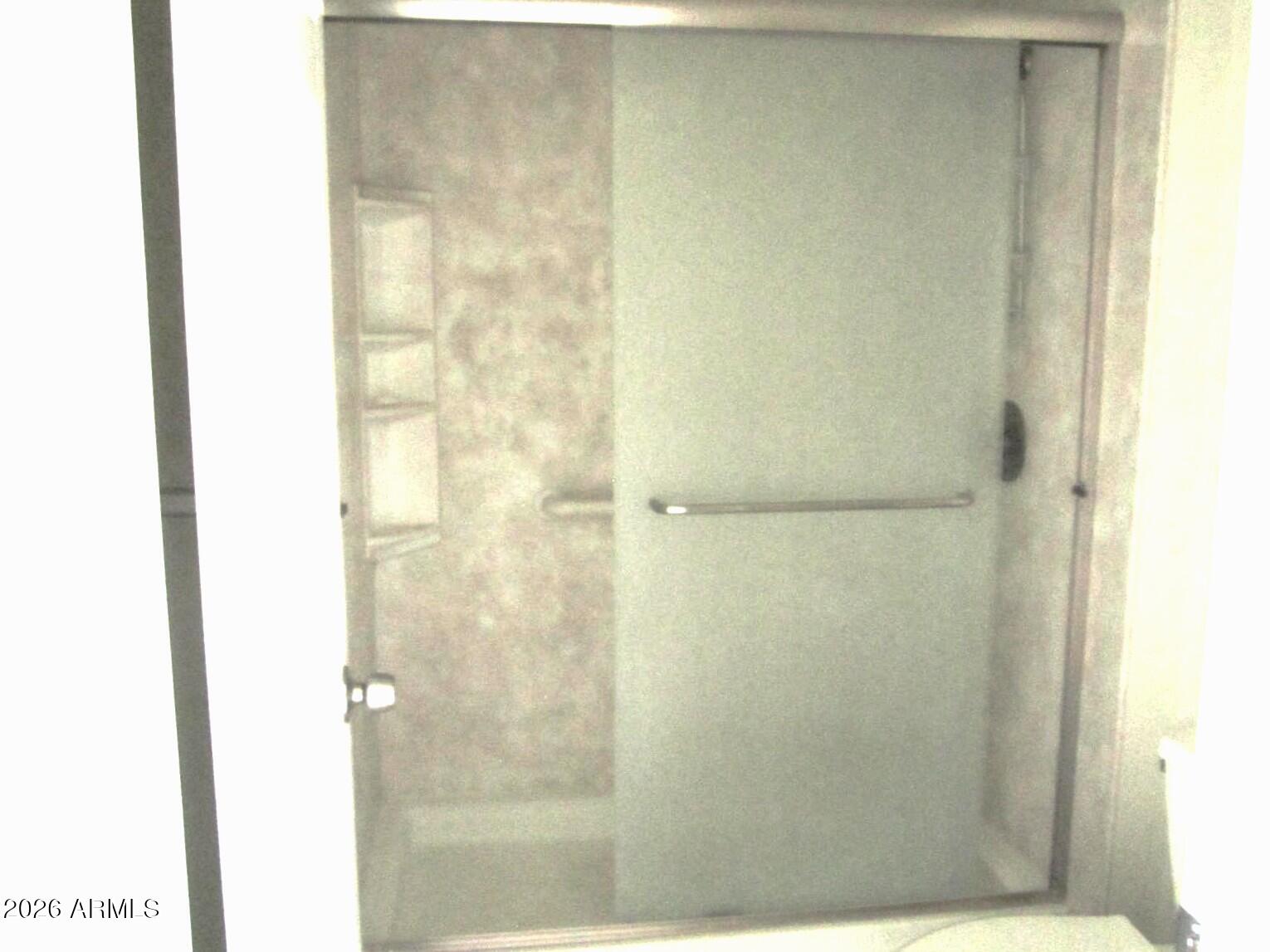 4303 East Cactus Road, Unit 419 Phoenix, AZ 85032 - Photo 11 of 34 a bathroom with a shower