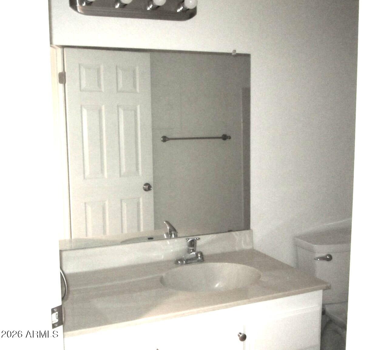 4303 East Cactus Road, Unit 419 Phoenix, AZ 85032 - Photo 34 of 34 a bathroom with bathtub and window