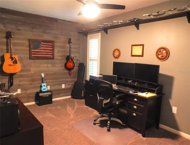 a work room with furniture and window