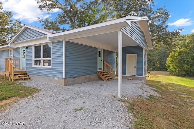 3023 Christmasville Road Jackson, TN 38305 - Photo 19 of 20 a view of a house with backyard