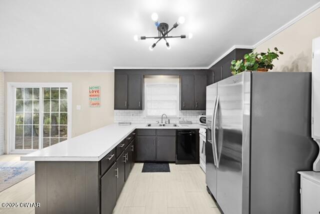 3023 Christmasville Road Jackson, TN 38305 - Photo 5 of 20 a kitchen with stainless steel appliances a stove a refrigerator and a sink