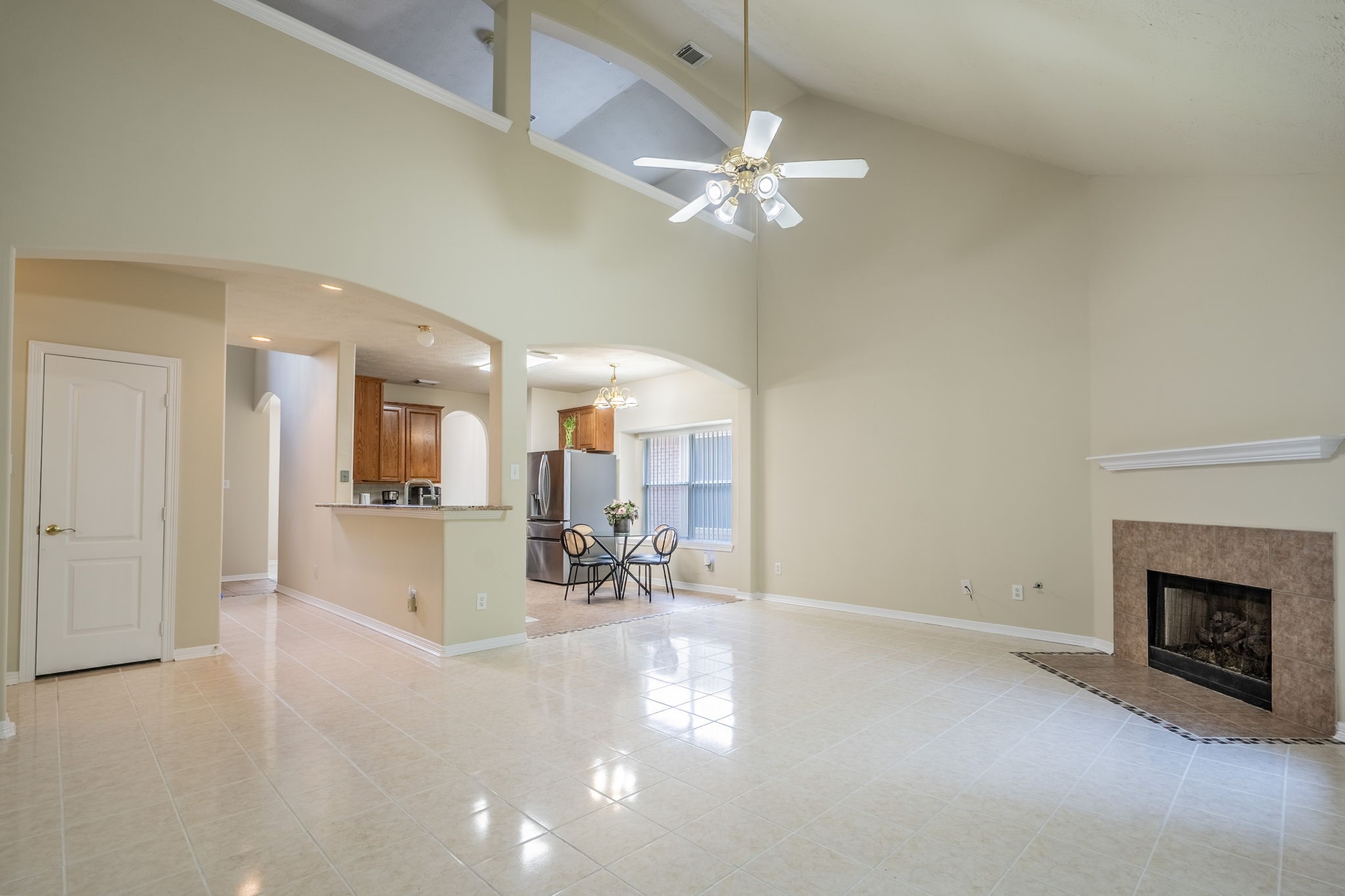 24139 Spring Sunset Drive Spring, TX 77373 - Photo 5 of 26 a view of a livingroom with furniture and a fireplace