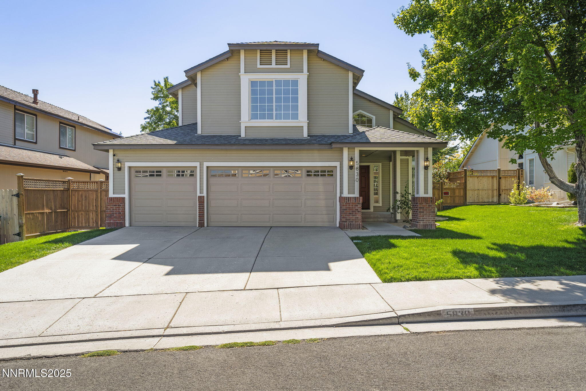 5830 Blue Horizon Drive Reno, NV 89523 - Photo 1 of 41 front view of a house with a yard