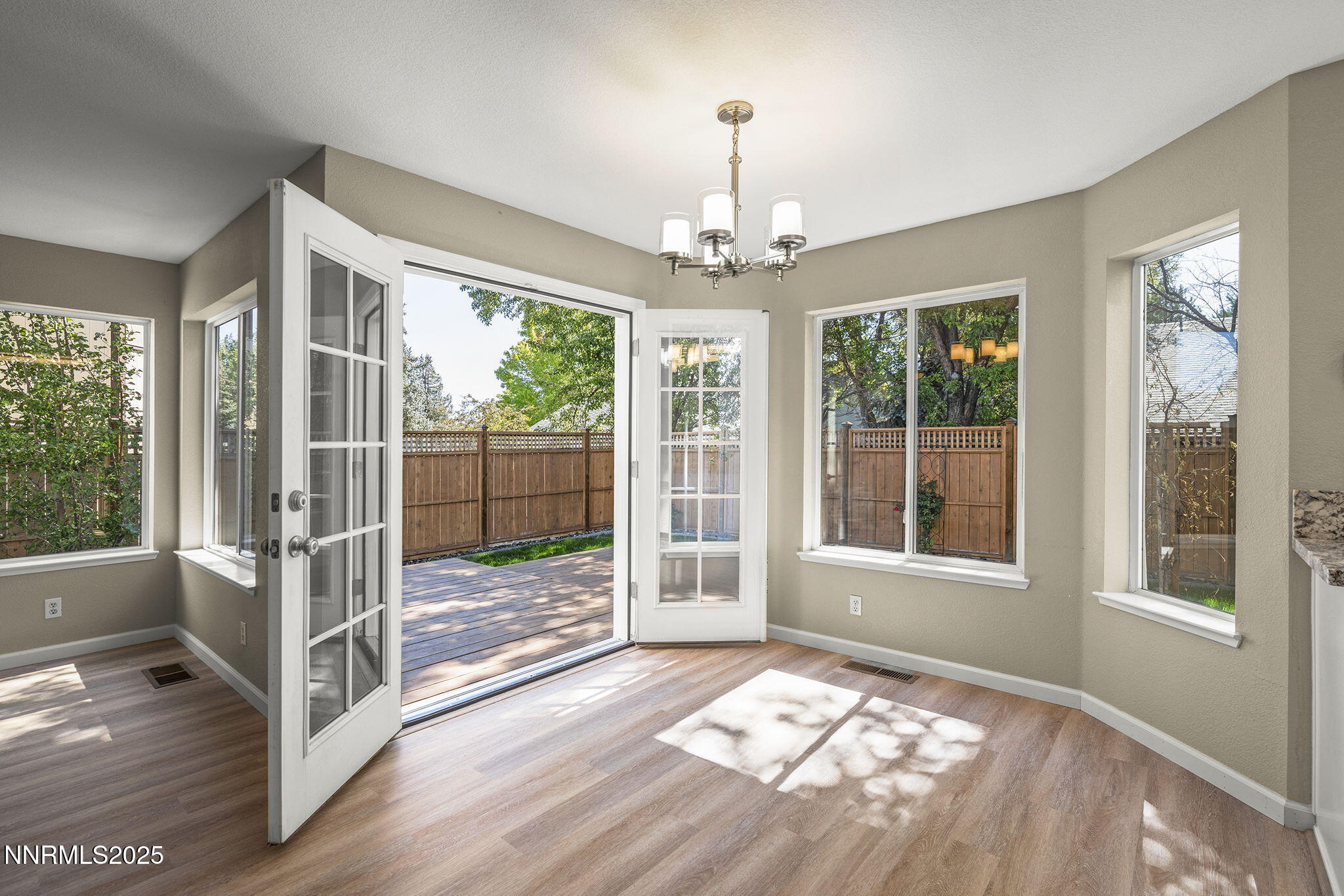 5830 Blue Horizon Drive Reno, NV 89523 - Photo 20 of 41 a view of an entryway with wooden floor and door