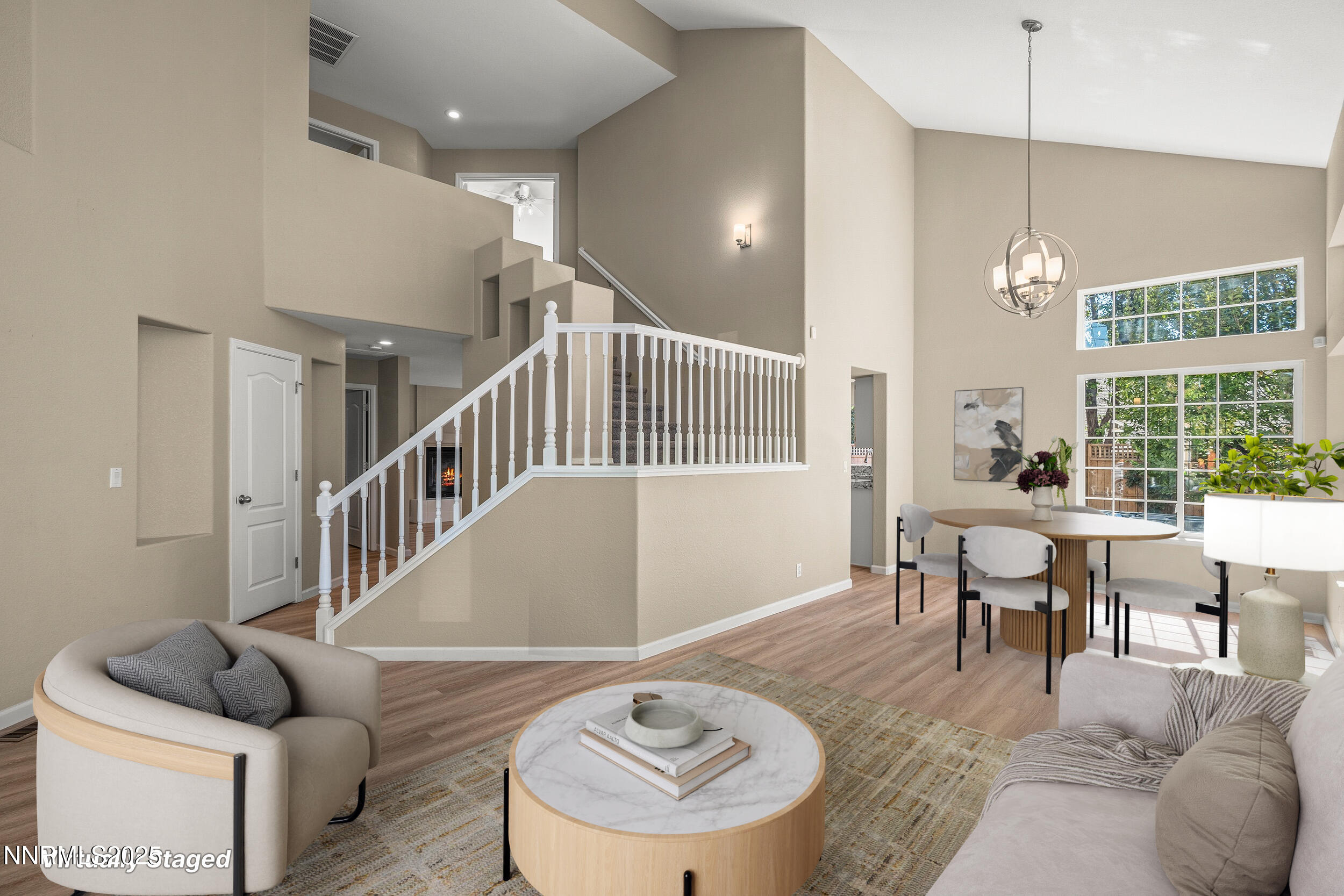 5830 Blue Horizon Drive Reno, NV 89523 - Photo 8 of 41 a living room with furniture and a dining table