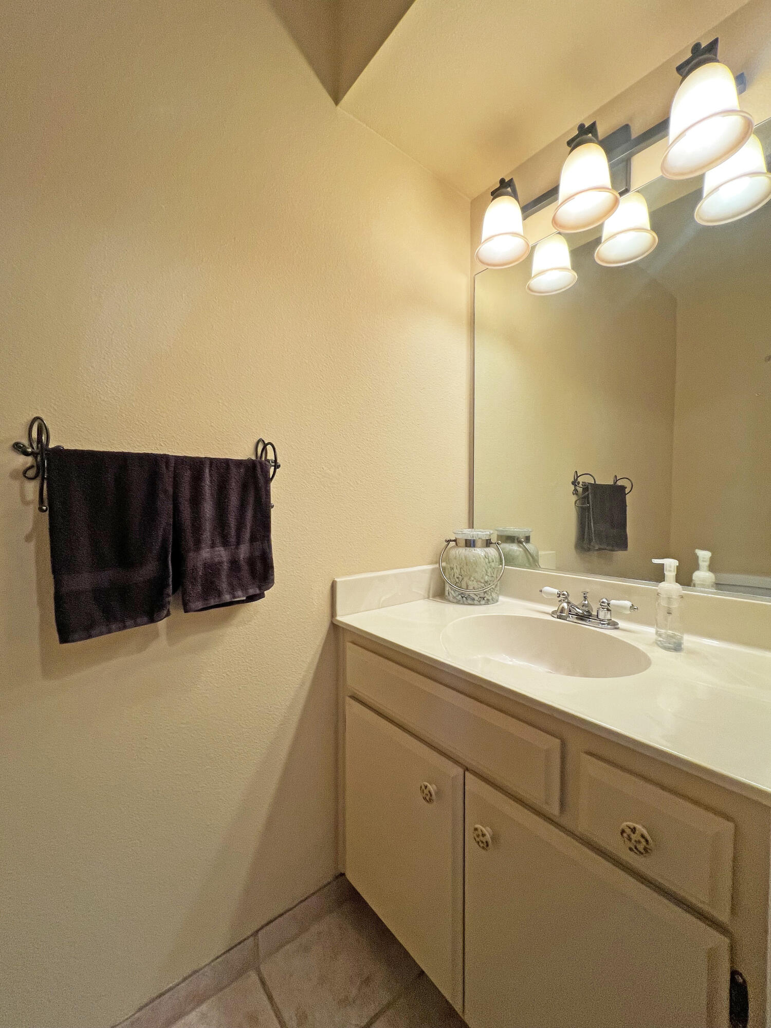 1337 Westbrook Drive Lompoc, CA 93436 - Photo 12 of 28 a bathroom with a sink and a mirror