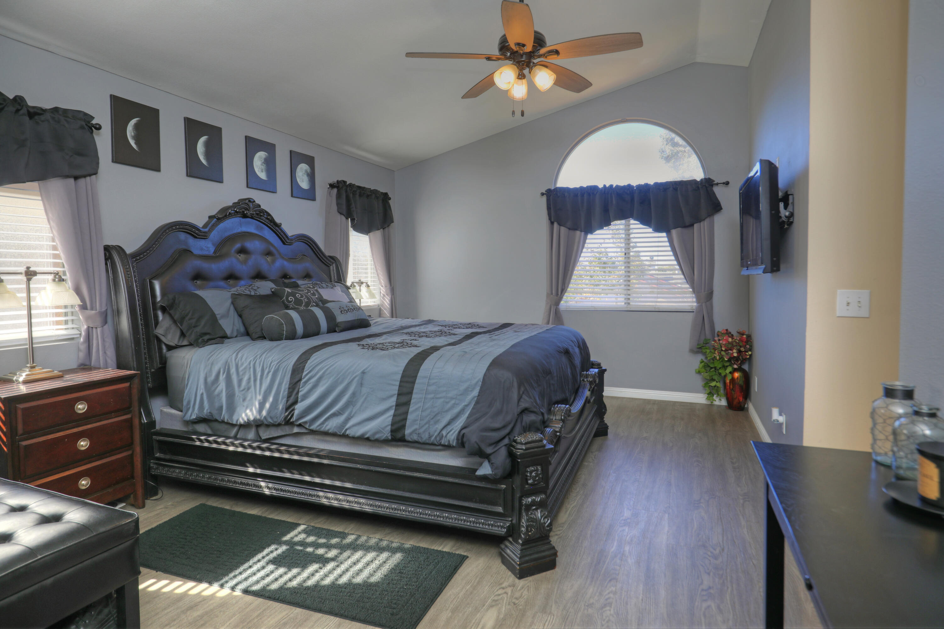1337 Westbrook Drive Lompoc, CA 93436 - Photo 18 of 28 a bedroom with a bed and wooden floor